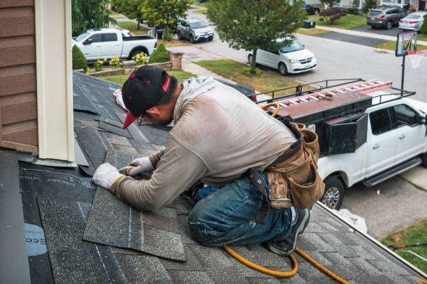 Professional Roofing technician working in Linden, CA